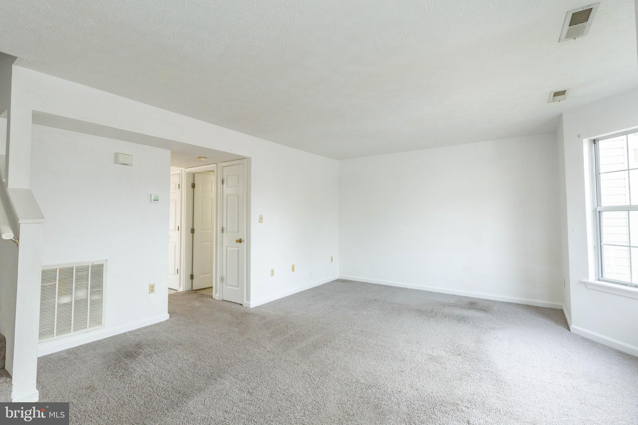 160 Stadium Circle Inwood, WV 25428 - Photo 21 of 29 a view of an empty room with a window