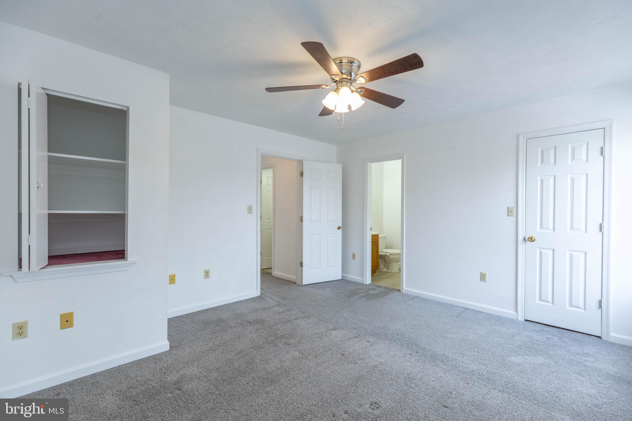 160 Stadium Circle Inwood, WV 25428 - Photo 6 of 29 a view of an empty room with a window