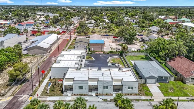 a bathroom with a granite countertop sink mirror and toilet
