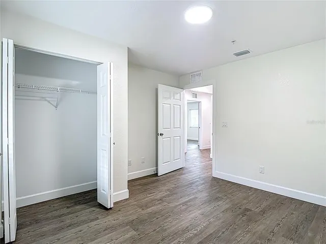 an aerial view of a house with a swimming pool