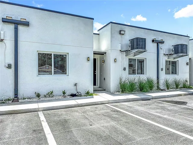 a kitchen with a refrigerator sink and microwave
