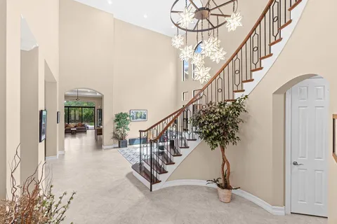 a view of entryway livingroom and hall
