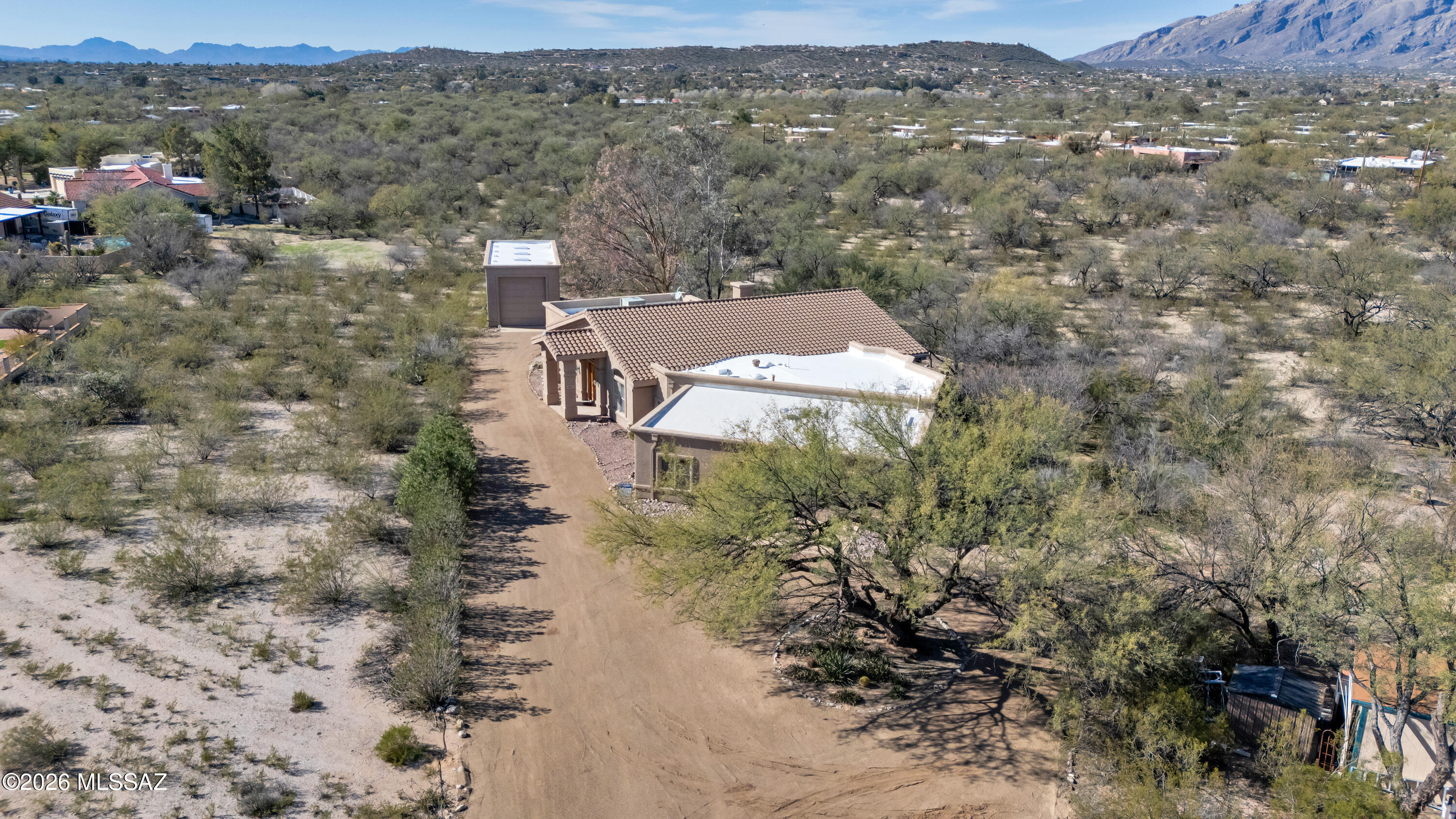4001 North Harrison Road Tucson, AZ 85749 - Photo 49 of 50 an aerial view of house with yard and mountain view