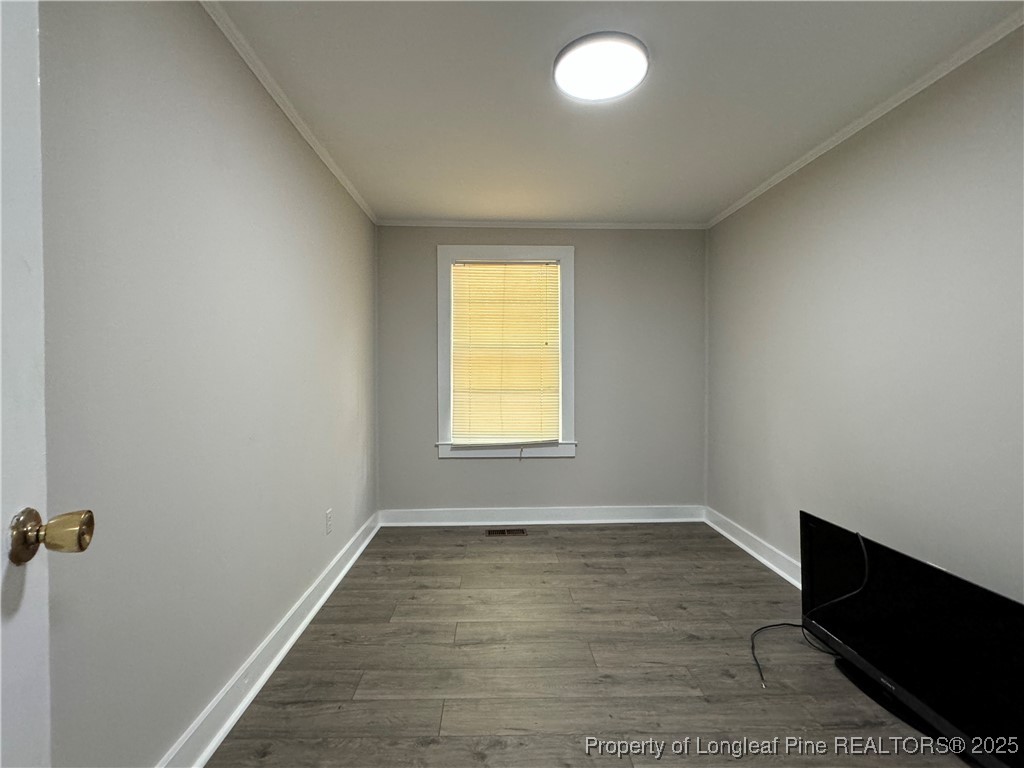 293 Army Road Raeford, NC 28376 - Photo 20 of 31 an empty room with a window