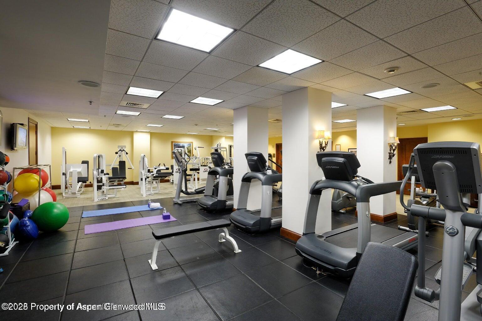 197 Prospector Road, Unit 2312 FW 21 22 49 Aspen, CO 81611 - Photo 16 of 19 a view of a room with gym equipment