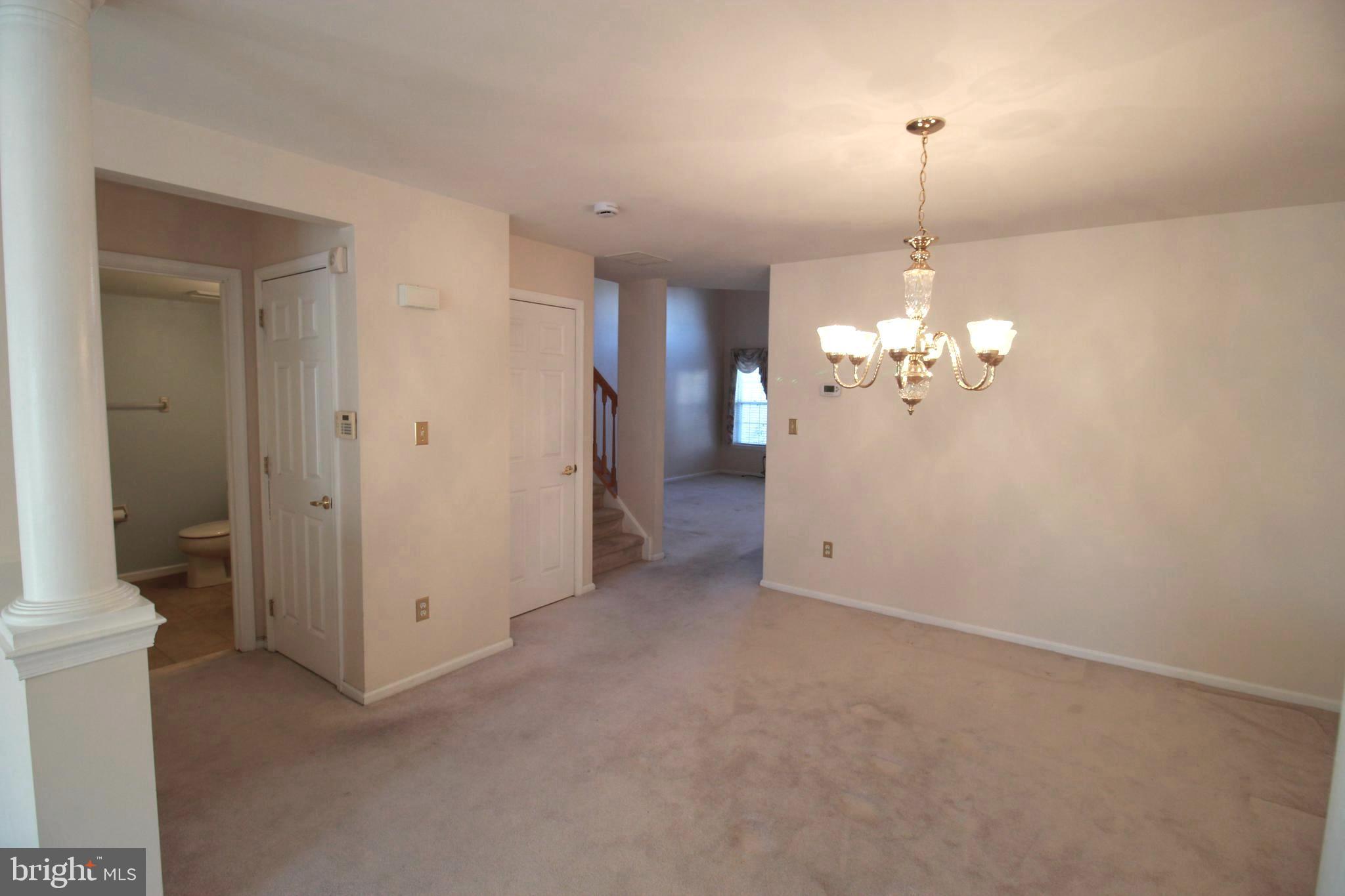 30 Leighton Drive Mount Laurel, NJ 08054 - Photo 4 of 22 a view of a big room with a chandelier