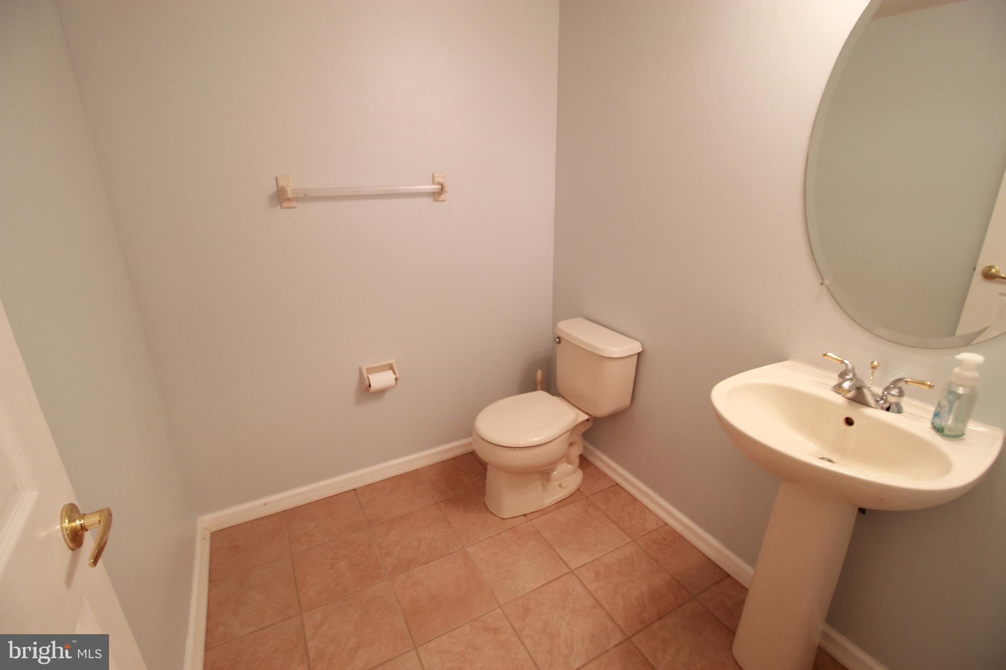 30 Leighton Drive Mount Laurel, NJ 08054 - Photo 5 of 22 a bathroom with a toilet a sink and mirror