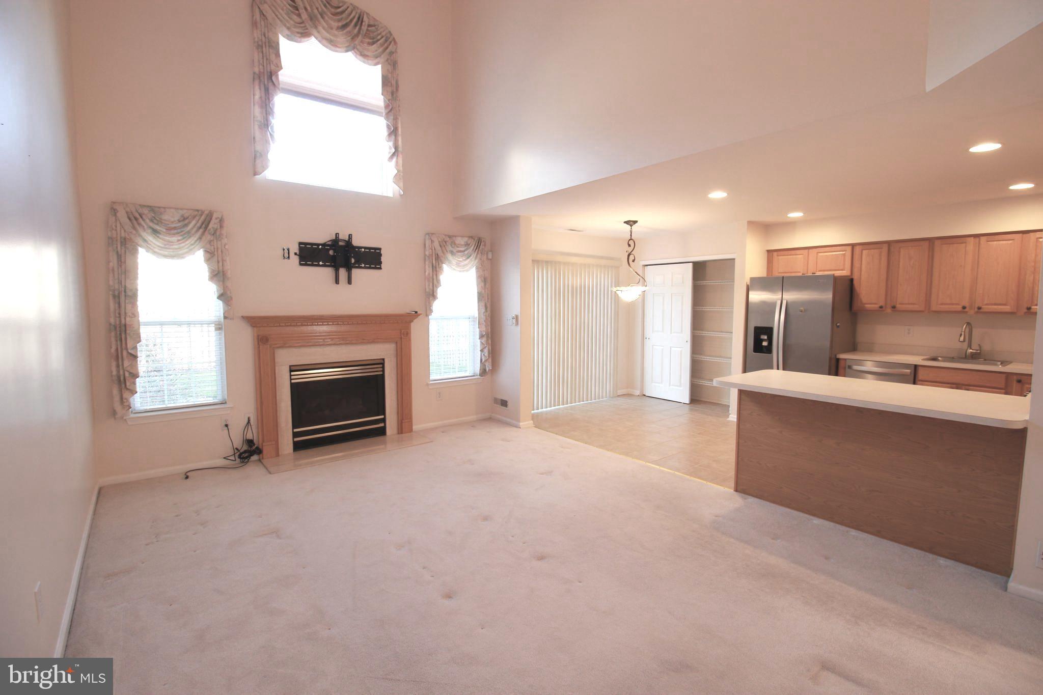 30 Leighton Drive Mount Laurel, NJ 08054 - Photo 8 of 22 a view of a kitchen with a sink and a fireplace
