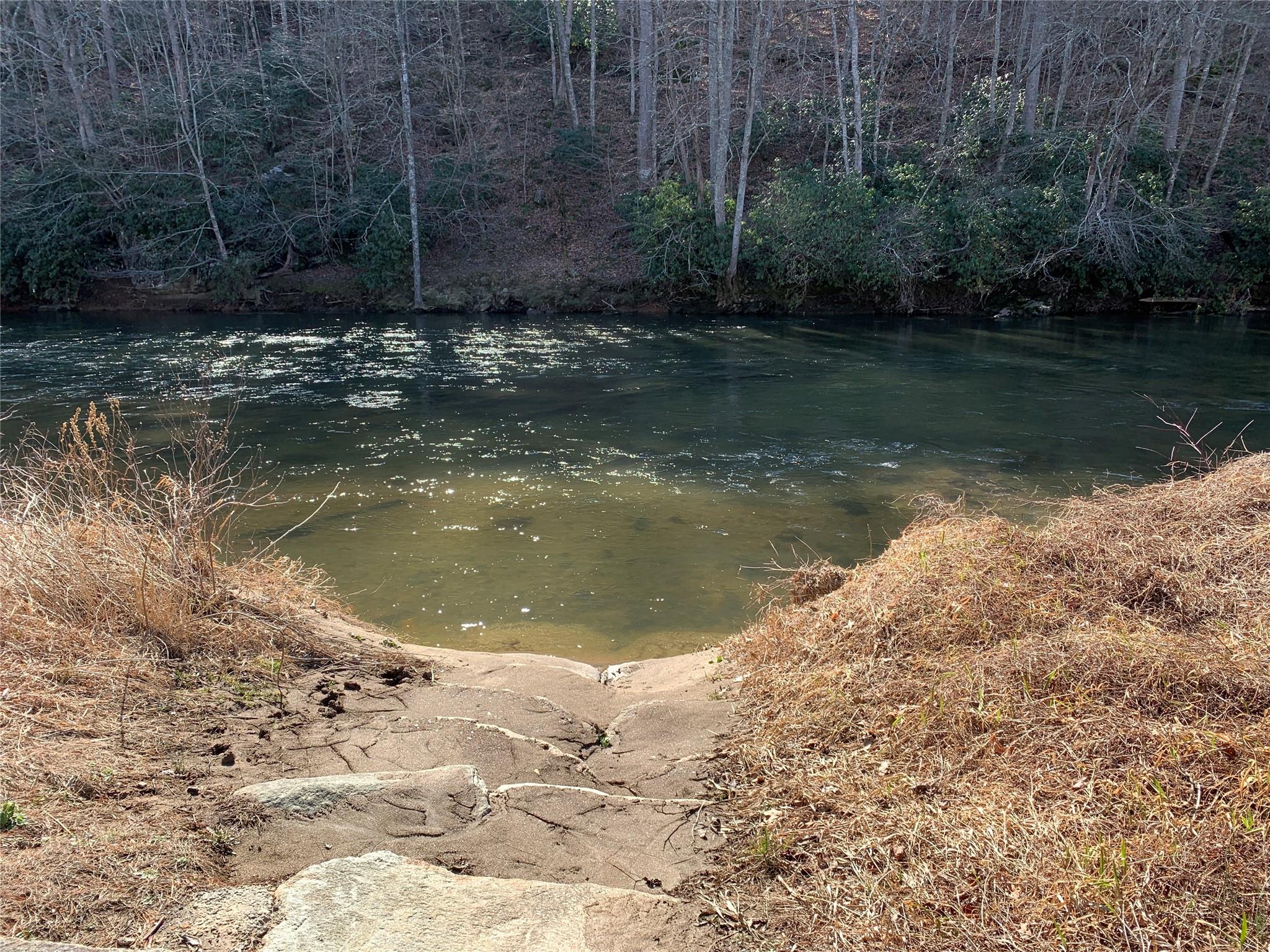 12 River Watch Trail Crumpler, NC 28617 - Photo 11 of 16 a view of a wooden floor with a lake view