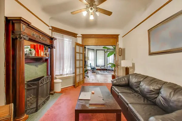 a view of a living room with a flat screen tv