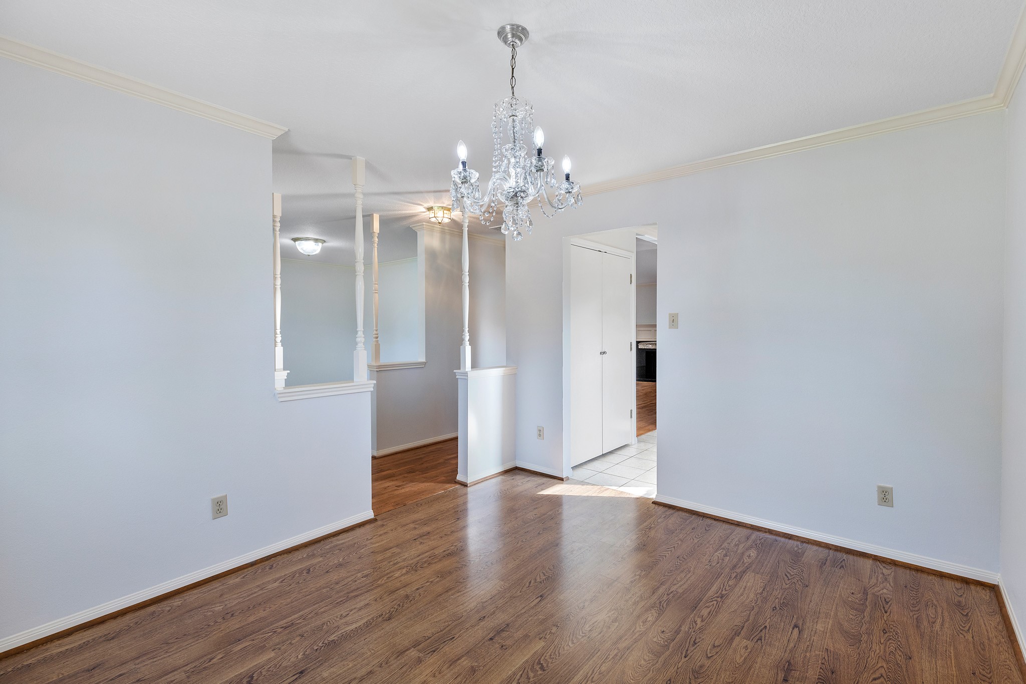 8018 Holiday Lane Houston, TX 77075 - Photo 8 of 42 a view of a chandelier in an empty room