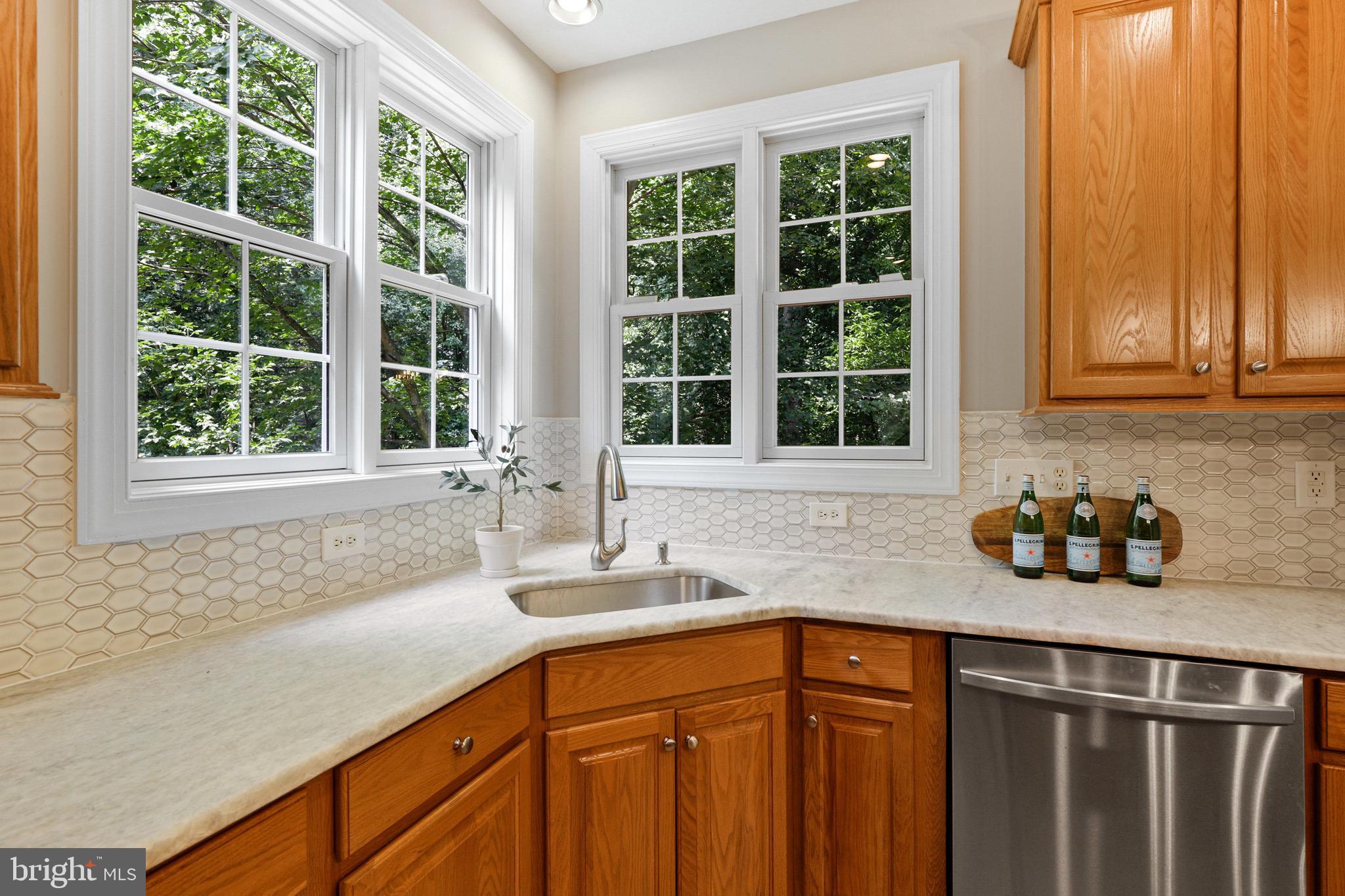 10181 Deep Skies Drive Laurel, MD 20723 - Photo 20 of 62 New granite counters and tile backsplash