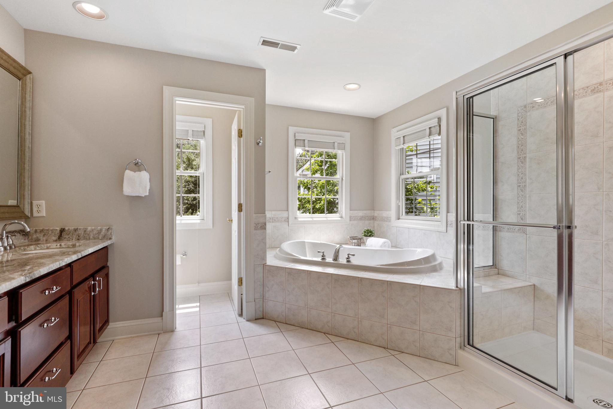 10181 Deep Skies Drive Laurel, MD 20723 - Photo 34 of 62 Primary Bath w/ soaking tub and shower