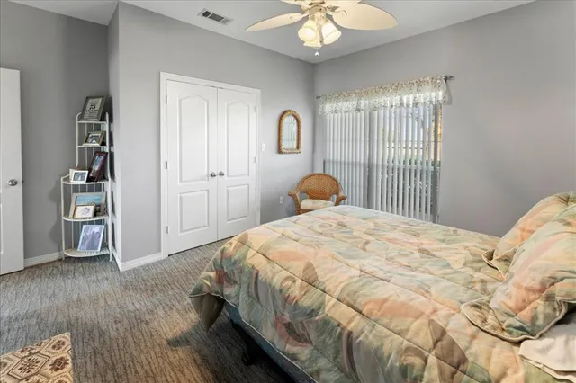 a utility room with sink dryer and washer