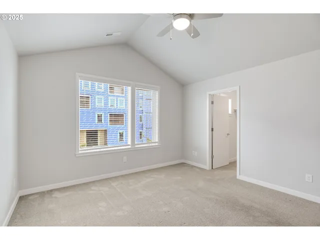 a view of a room with a hallway