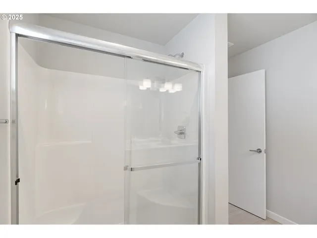 a bathroom with a sink vanity and mirror