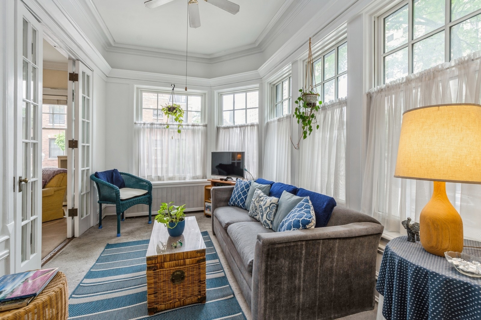 3122 North Sheridan Road, Unit 1B Chicago, IL 60657 - Photo 14 of 16 a living room with furniture and wooden floor