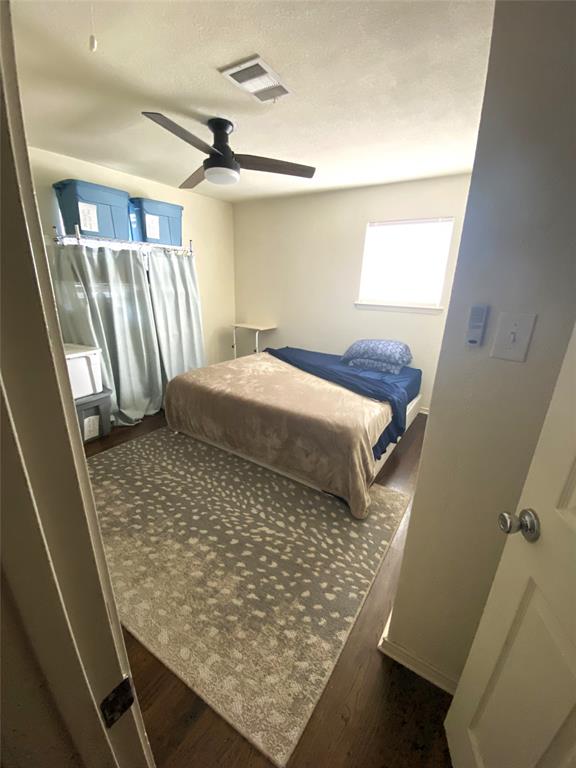 321 School House Road Paradise, TX 76073 - Photo 17 of 18 a bedroom with a bed and a window
