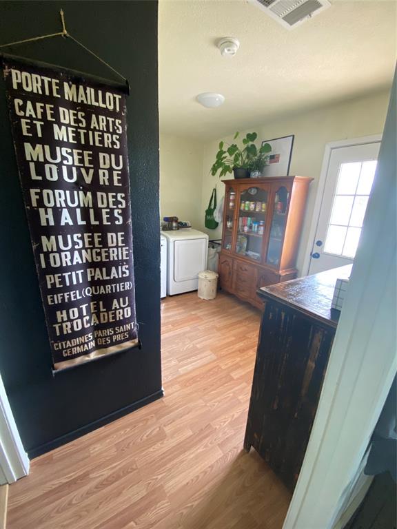 321 School House Road Paradise, TX 76073 - Photo 6 of 18 a view of livingroom with furniture and wooden floor