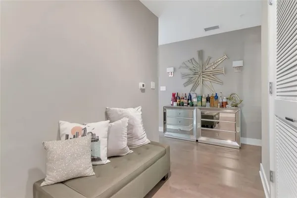 a living room with fireplace furniture and a flat screen tv