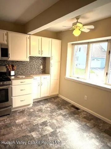 a view of a hallway with closet