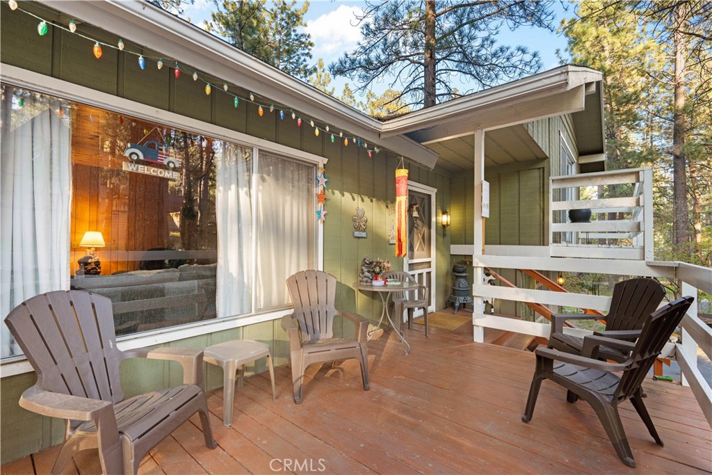 1130 Robin Road Wrightwood, CA 92397 - Photo 3 of 34 a view of a patio with table and chairs