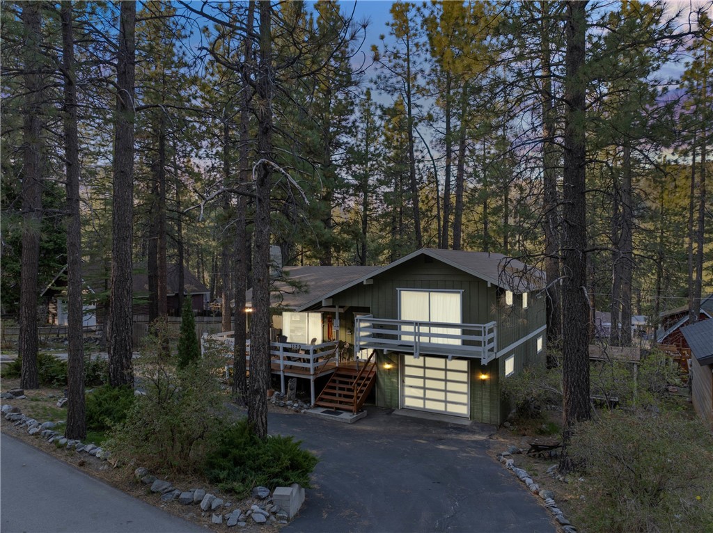 1130 Robin Road Wrightwood, CA 92397 - Photo 31 of 34 a front view of a house with garden