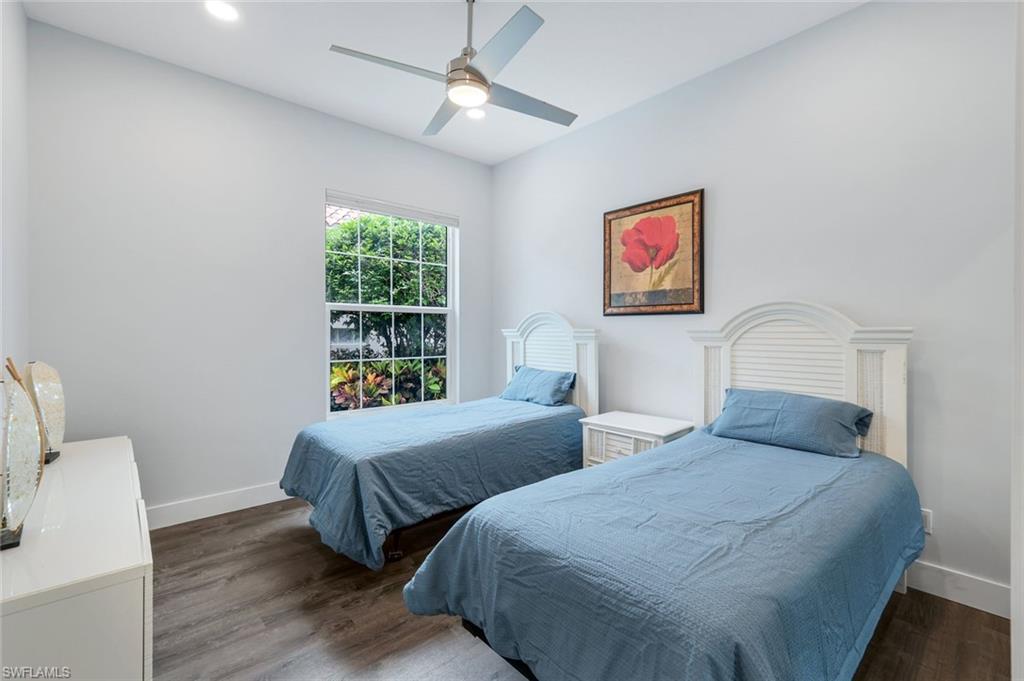 4648 Rio Poco Court Naples, FL 34109 - Photo 23 of 27 3rd Bedroom with baseboards, finished floors, and ceiling fan
