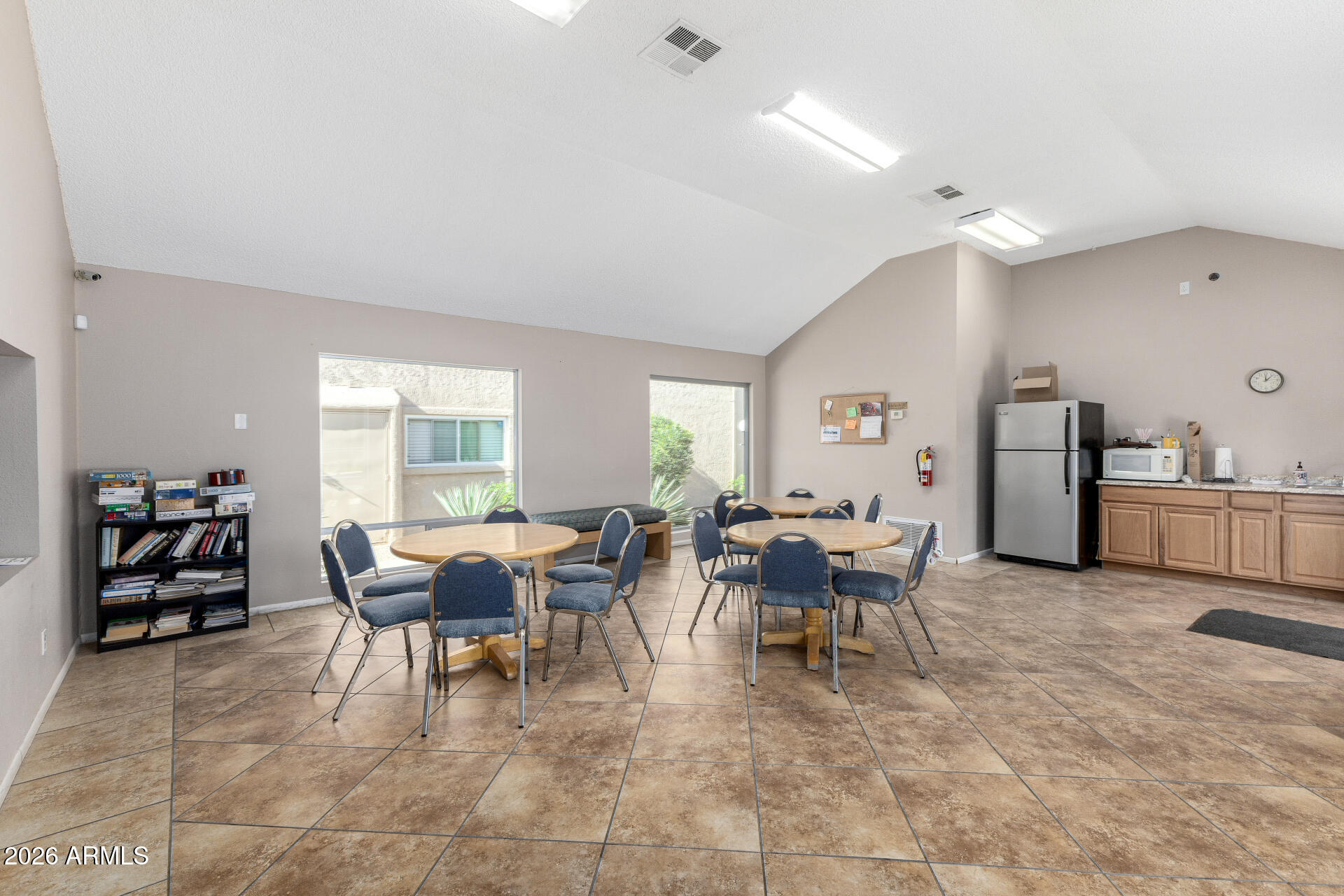 5525 East Thomas Road, Unit H7 Phoenix, AZ 85018 - Photo 24 of 27 a view of a dining room with furniture