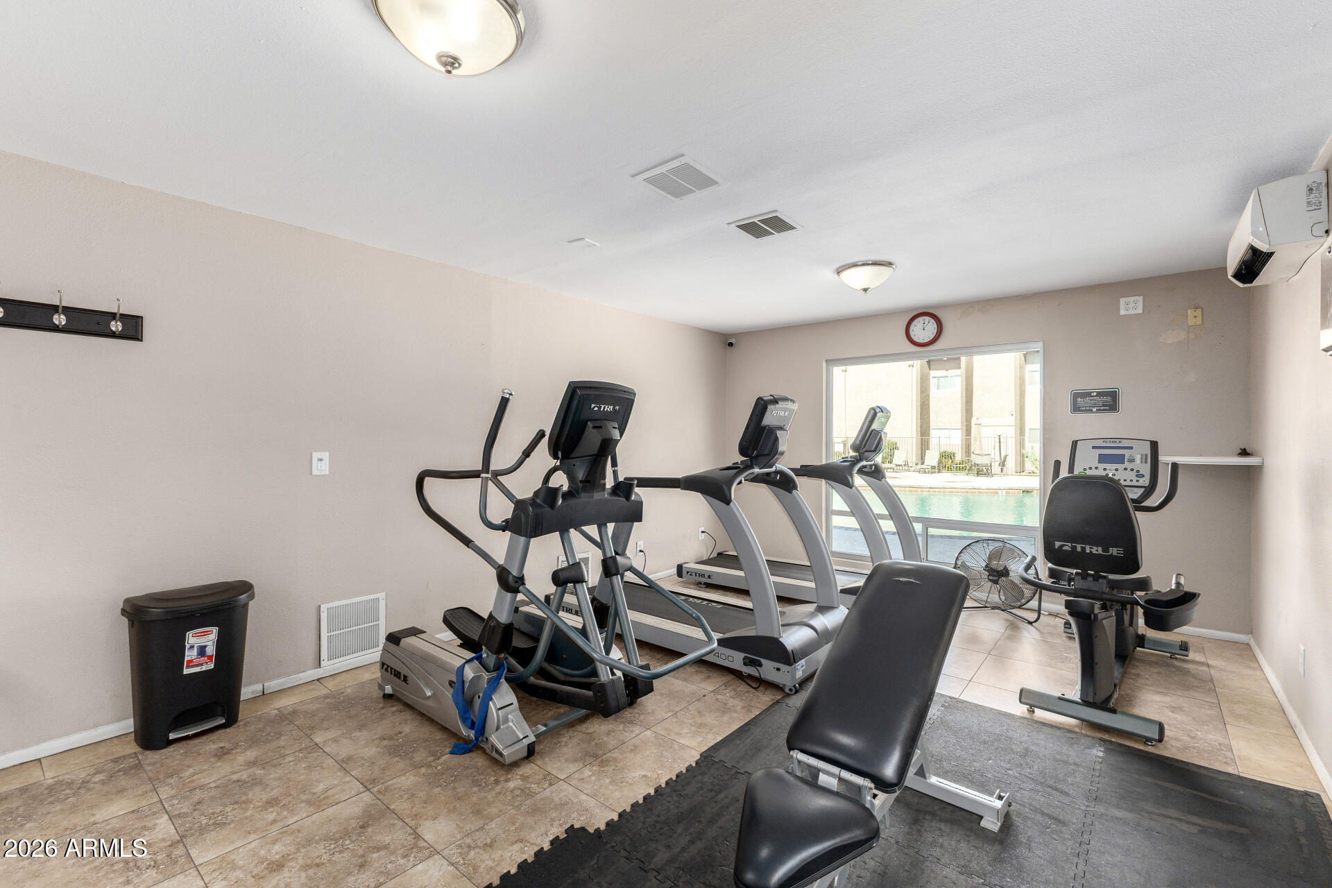 5525 East Thomas Road, Unit H7 Phoenix, AZ 85018 - Photo 26 of 27 a view of a room with gym equipment