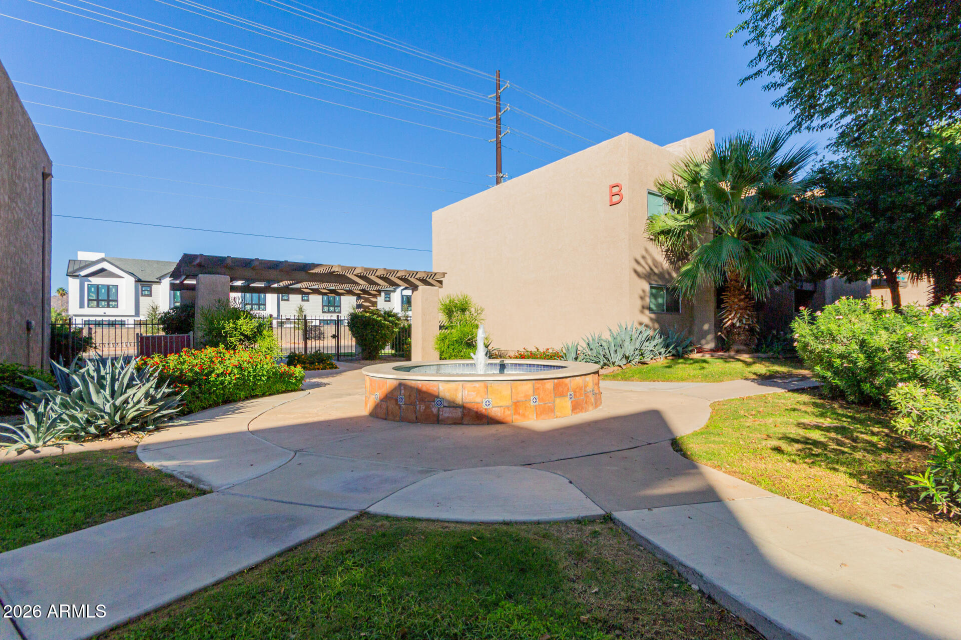 5525 East Thomas Road, Unit H7 Phoenix, AZ 85018 - Photo 27 of 27 a view of a house with swimming pool