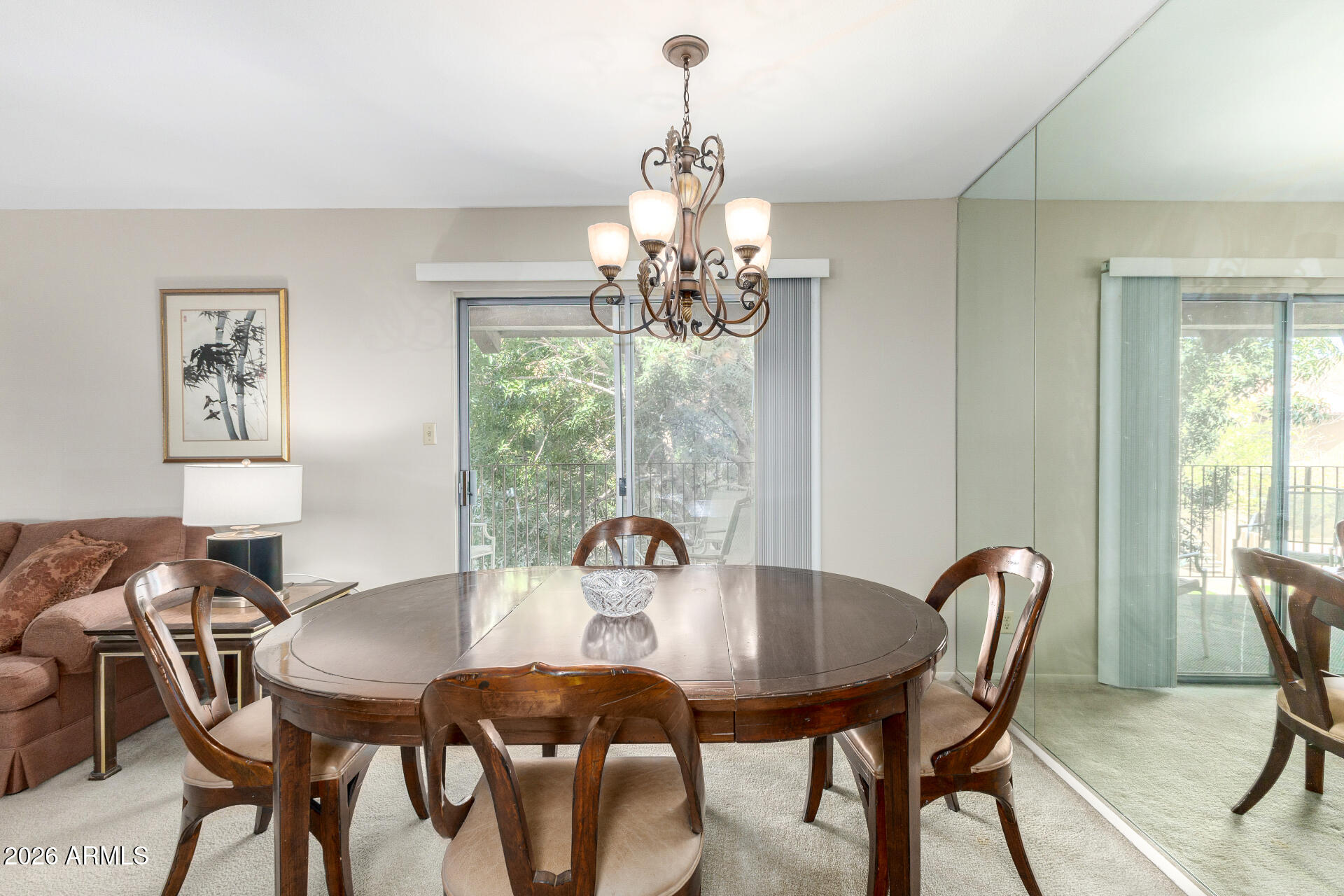 5525 East Thomas Road, Unit H7 Phoenix, AZ 85018 - Photo 8 of 27 a view of a dining room with furniture window and outside view
