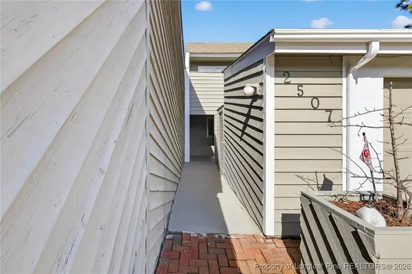 a balcony with wooden floor