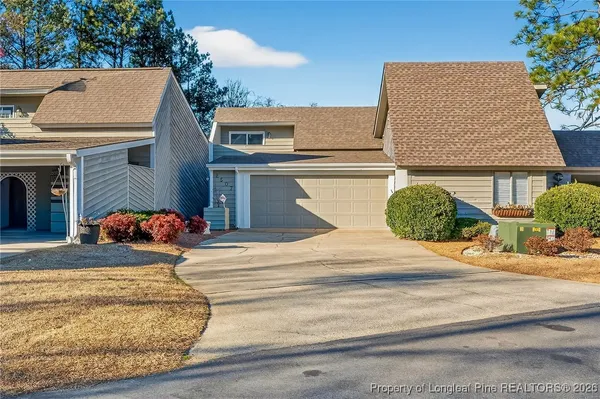 front view of a house with a street