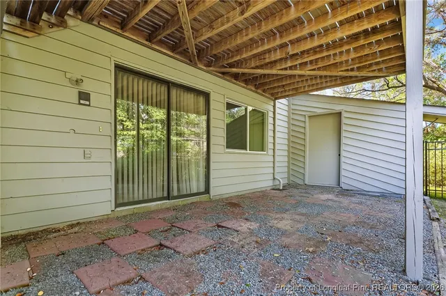 a view of backyard with green space