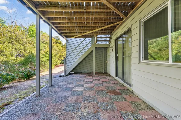 a view of entryway with a front door