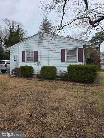 a view of a backyard of the house