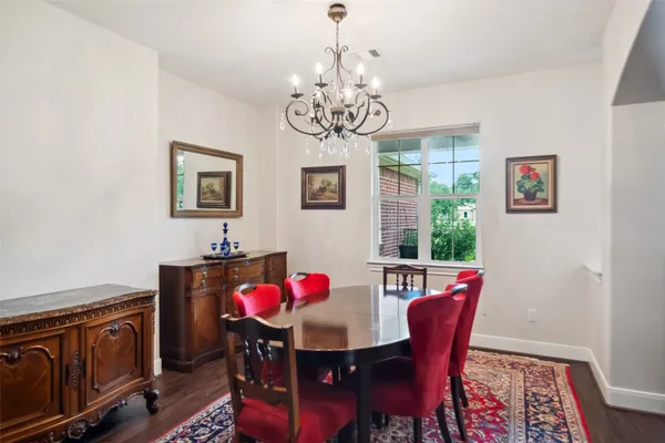 a living room with fireplace furniture and a flat screen tv