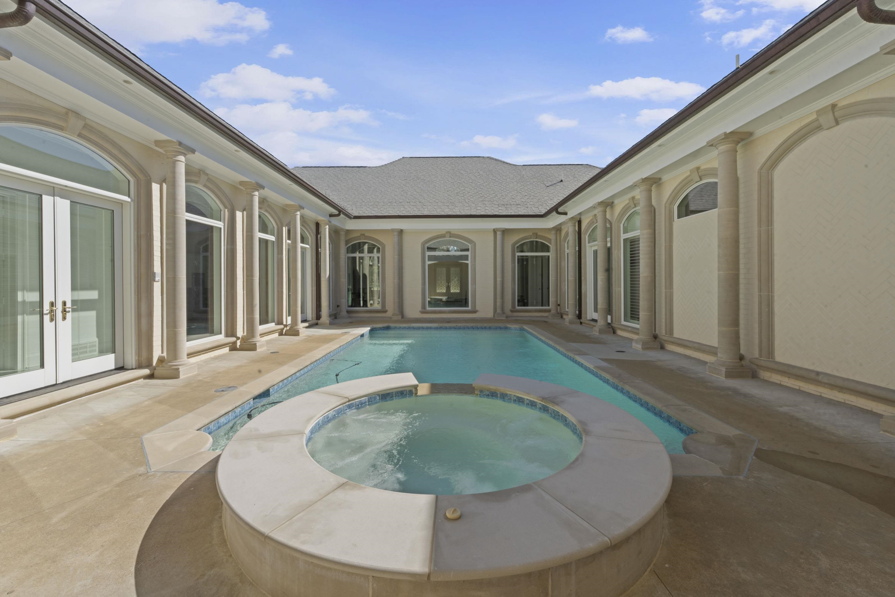 881 Bray Station Road Collierville, TN 38017 - Photo 37 of 40 View of swimming pool featuring french doors, a pool with connected hot tub, and a patio area