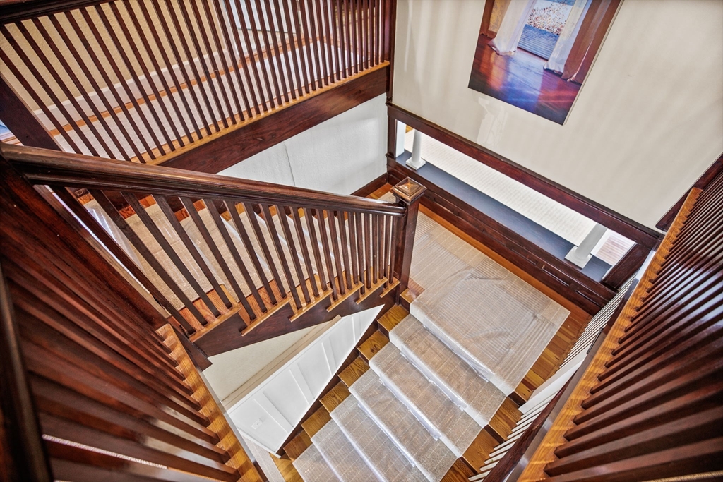75 Surfside Road Scituate, MA 02066 - Photo 17 of 25 a view of a staircase