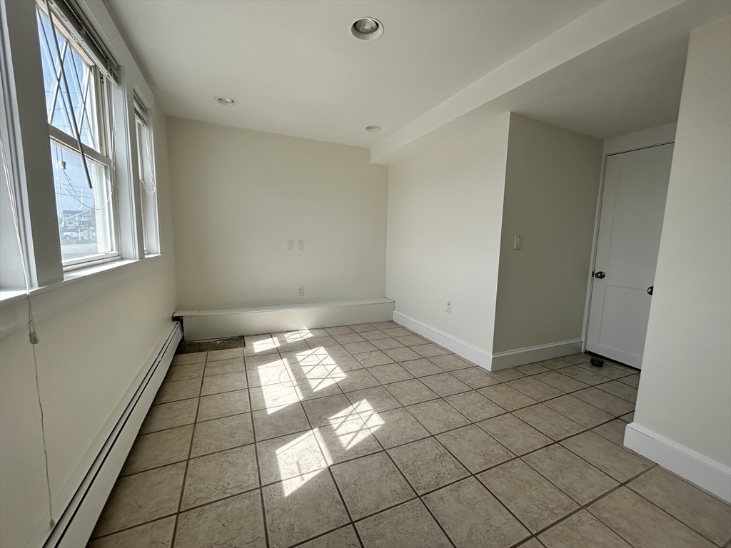 75 Surfside Road Scituate, MA 02066 - Photo 24 of 25 a view of an empty room and window