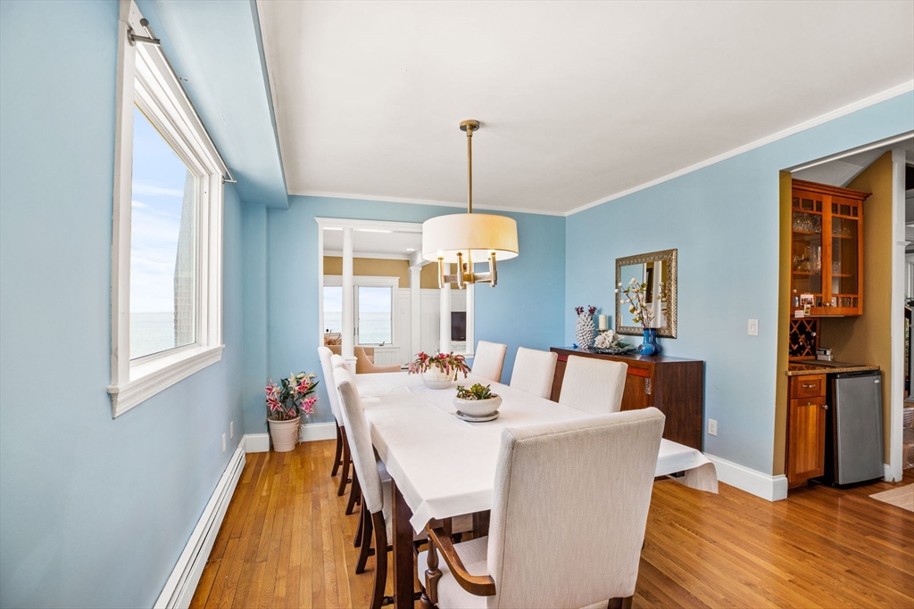 75 Surfside Road Scituate, MA 02066 - Photo 8 of 25 a view of a dining room with furniture and window