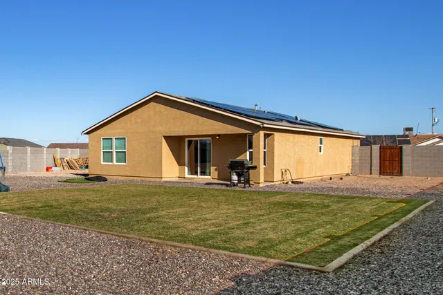 a view of a house with a big yard
