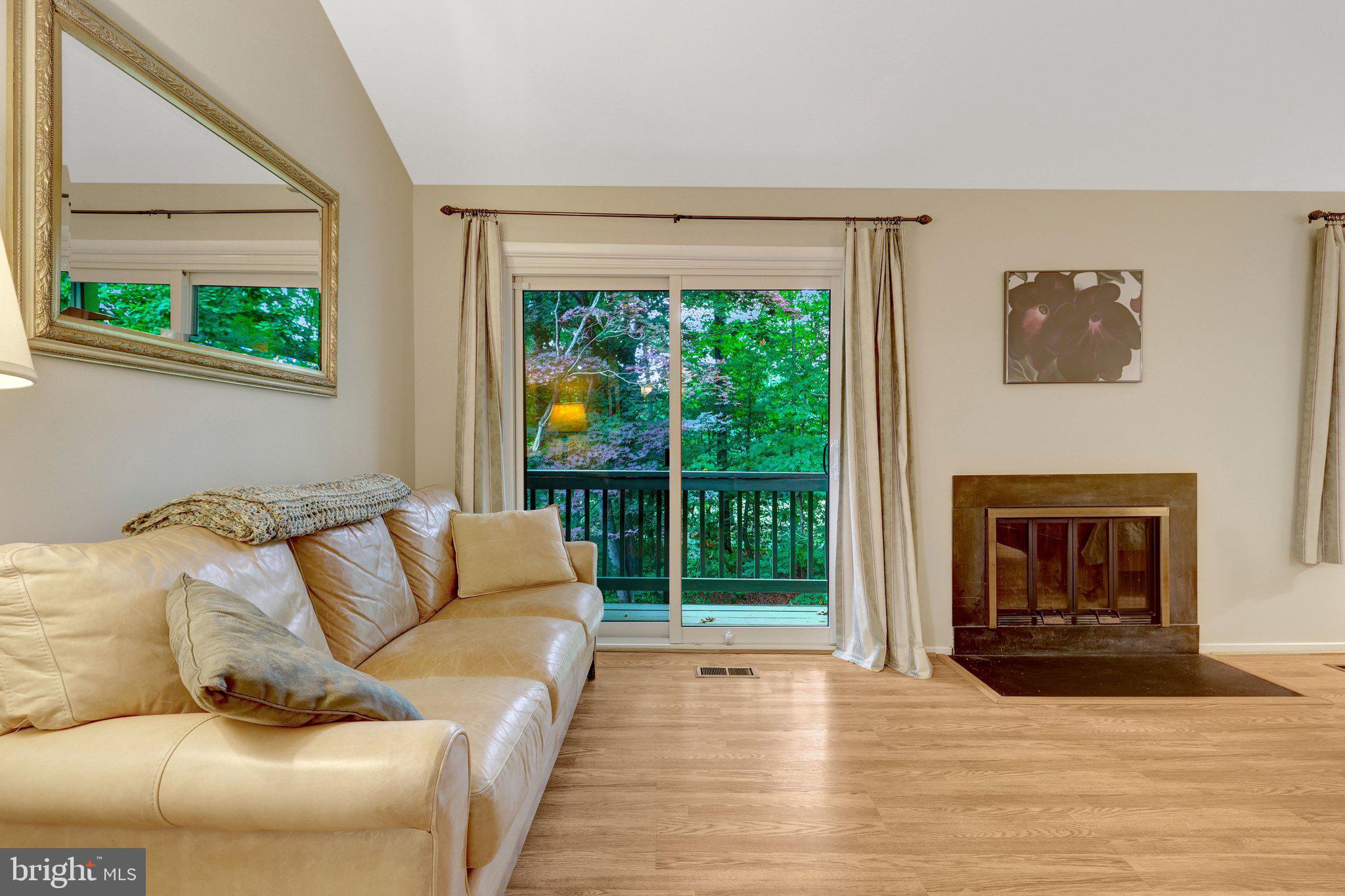 2014 Winged Foot Court Reston, VA 20191 - Photo 27 of 74 Primary bedroom sitting area with deck and firepla