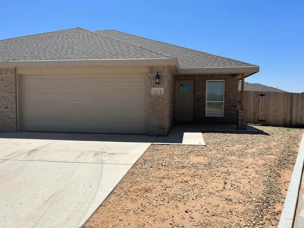 a house view with a backyard