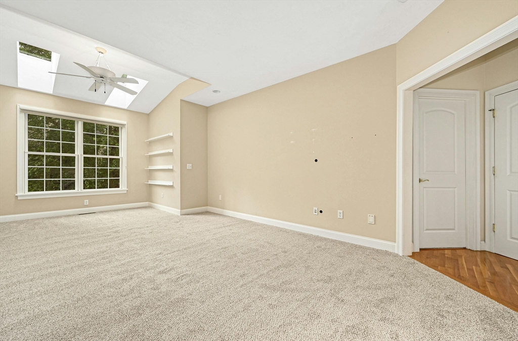 47 Clubhouse Way, Unit 47 Sutton, MA 01590 - Photo 13 of 30 an empty room with windows