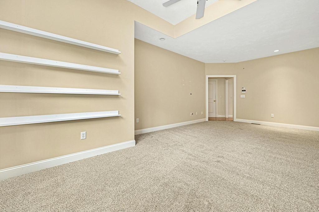 47 Clubhouse Way, Unit 47 Sutton, MA 01590 - Photo 14 of 30 a view of an empty room with a window