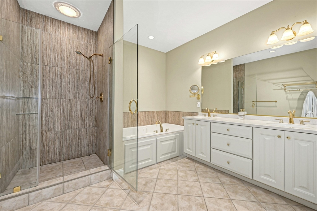 47 Clubhouse Way, Unit 47 Sutton, MA 01590 - Photo 16 of 30 a bathroom with a sink a toilet and shower