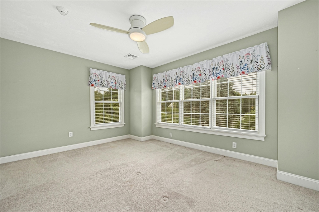 47 Clubhouse Way, Unit 47 Sutton, MA 01590 - Photo 18 of 30 a view of an empty room with a window