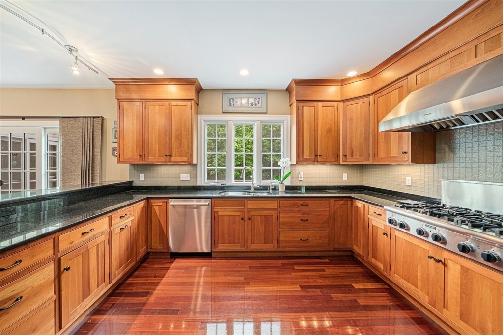 6 Northey Farm Road Scituate, MA 02066 - Photo 13 of 40 a large kitchen with stainless steel appliances granite countertop a stove a sink and a granite counter tops
